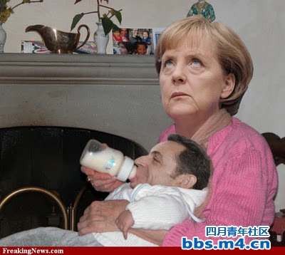 Merkel feeds baby Sarko.jpg