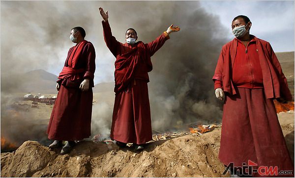Tibertan monks ferried bodies to a dusty rise near Jiegu before setting cremation pyres ablaze. 